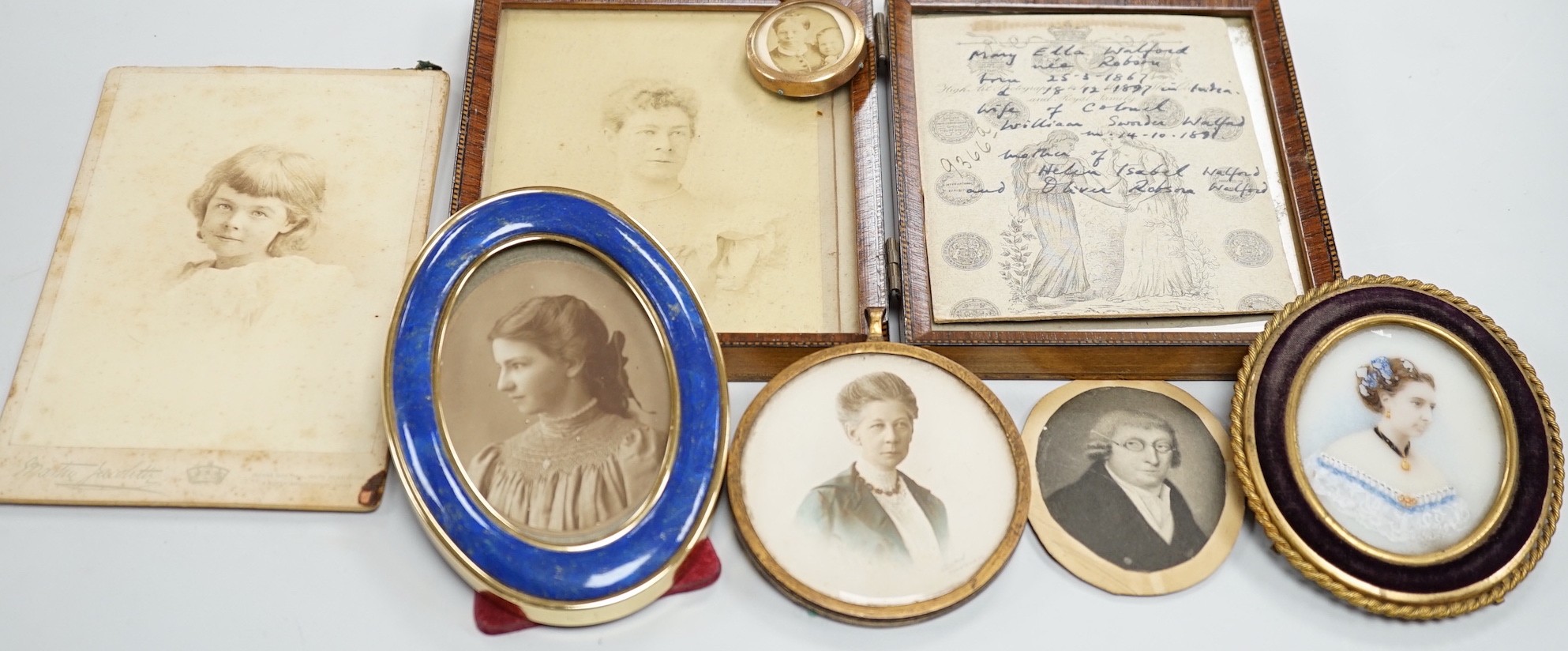 A selection of portrait photographs and miniatures relating to the Robson Family. To include the subjects of: Mary Jane Robson, Caroline Eliza Robson (1852-1947), photograph taken by Walter Charles Corin of Haslemere, Ma
